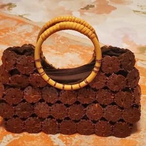 Engraved shell brown mini bag.